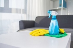 table-top-house-cleaning-products-spray-glove_1088-1012